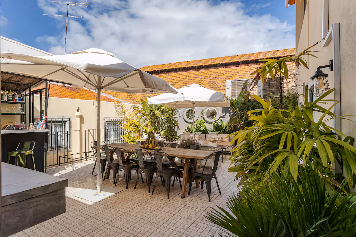 Outdoor terrace with long dining table